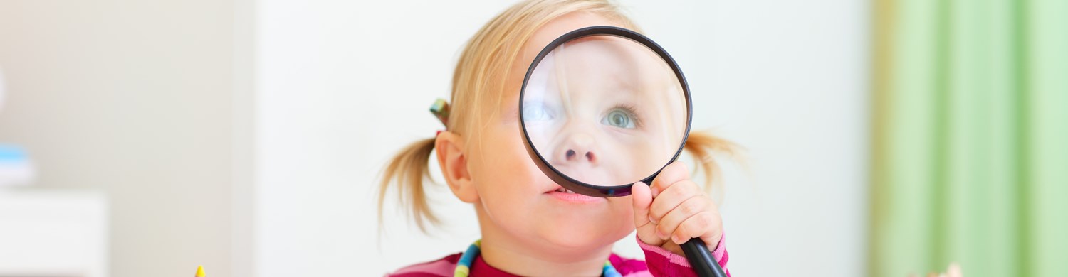 1707763-toddler-girl-looking-through-magnifier.jpg